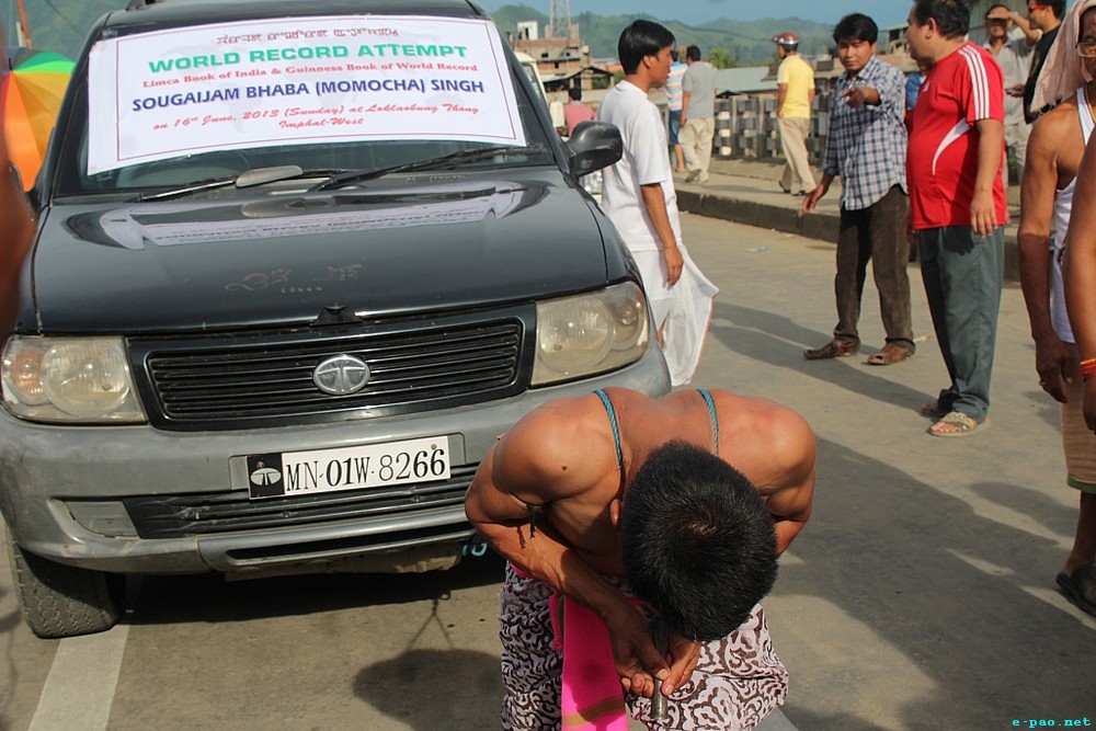 Sougaijam Bhaba pulled an SUV (A Tata 4 Wheel Drive) with help of pointed spear fitted on his throat :: 16 June 2013