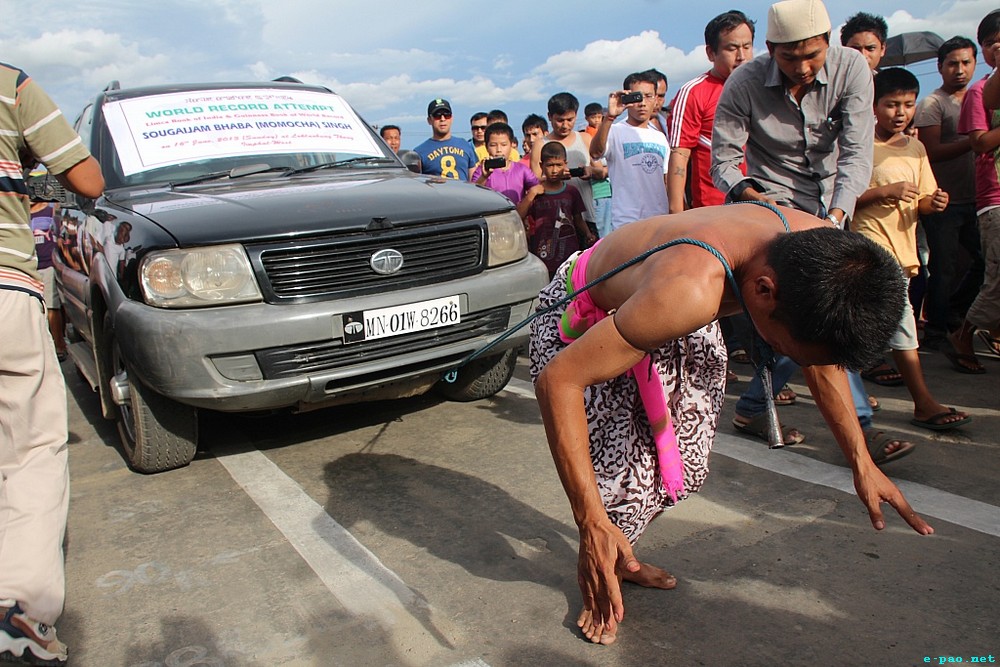 Sougaijam Bhaba pulled an SUV with help of pointed spear fitted on his throat :: 16 June 2013
