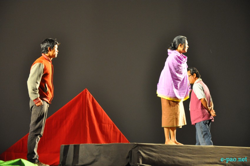 A scene from ''Angaobise Eigidi Emani'  played at Maharaja Chandrakriti Auditorium (MCA) on 22 January 2014