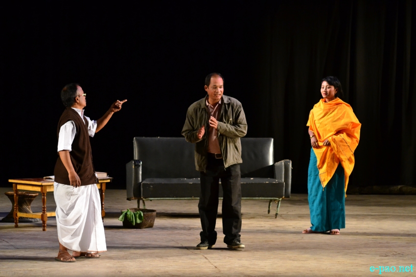 A scene from 'Naimu Ama'   played at Maharaja Chandrakriti Auditorium (MCA) on 21st January 2014