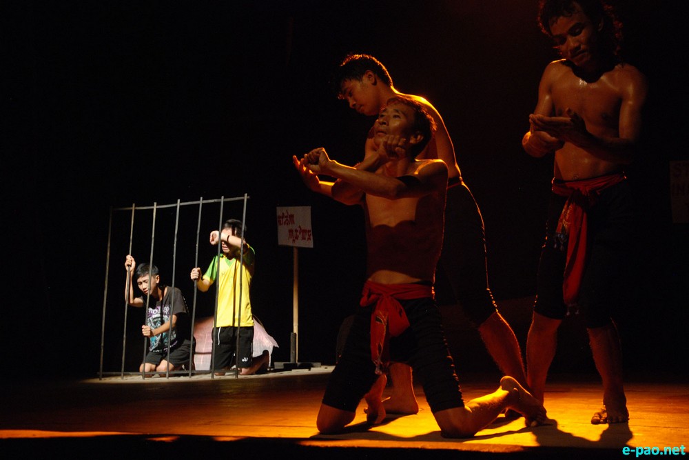 A scene from Nongmei Maru (The Bullet) played at MDU Hall on 03 August 2014  