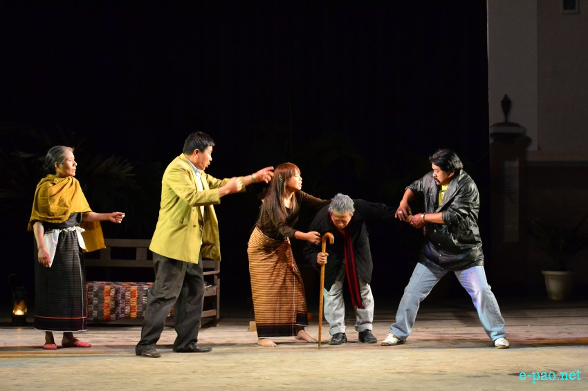 A scene from 'Ringchammei Thang Theichammei'   played at Maharaja Chandrakriti Auditorium (MCA) on 24 January 2014