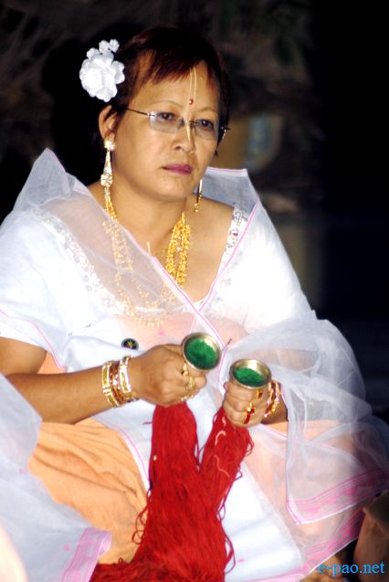 Devotees sing devotional songs on Jhulon Festival at Nityainanda temple, Nityainanda  , Imphal :: August 2013