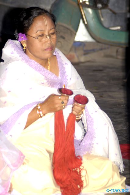 Devotees sing devotional songs on Jhulon Festival at Nityainanda temple, Nityainanda  , Imphal :: August 2013