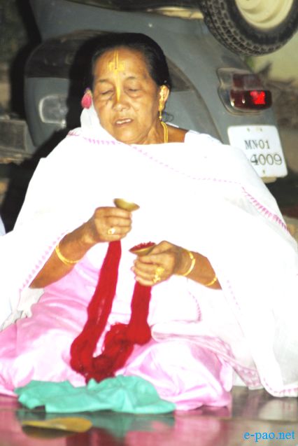 Devotees sing devotional songs on Jhulon Festival at Nityainanda temple, Nityainanda  , Imphal :: August 2013