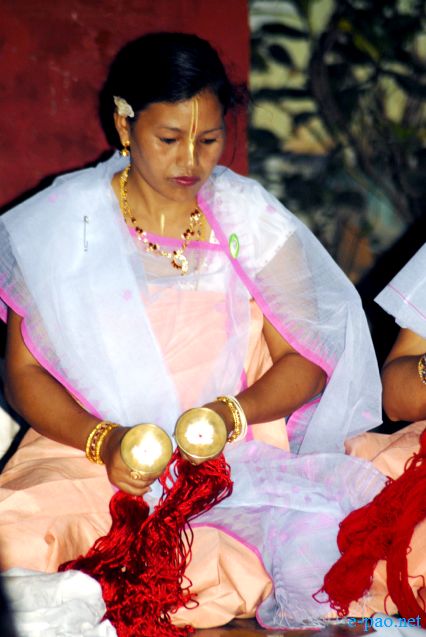 Devotees sing devotional songs on Jhulon Festival at Nityainanda temple, Nityainanda  , Imphal :: August 2013