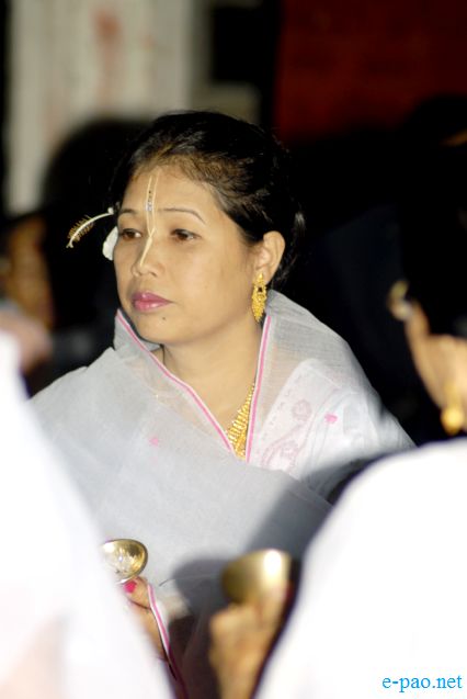 Devotees sing devotional songs on Jhulon Festival at Nityainanda temple, Nityainanda  , Imphal :: August 2013