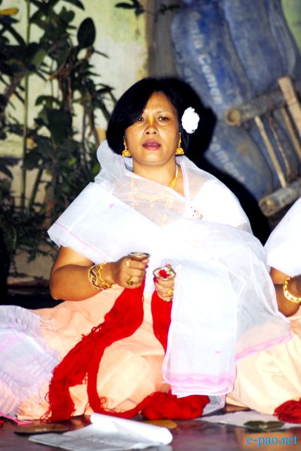 Devotees sing devotional songs on Jhulon Festival at Nityainanda temple, Nityainanda  , Imphal :: August 2013