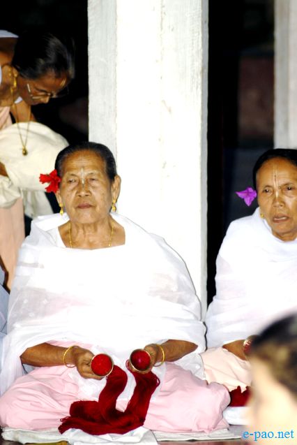 Devotees sing devotional songs on Jhulon Festival at Nityainanda temple, Nityainanda  , Imphal :: August 2013