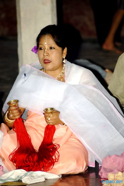 Devotees sing devotional songs on Jhulon Festival at Nityainanda temple, Nityainanda  , Imphal :: August 2013