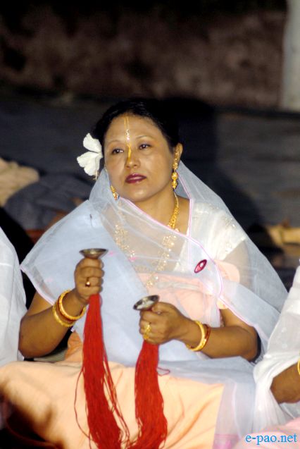 Devotees sing devotional songs on Jhulon Festival at Nityainanda temple, Nityainanda  , Imphal :: August 2013