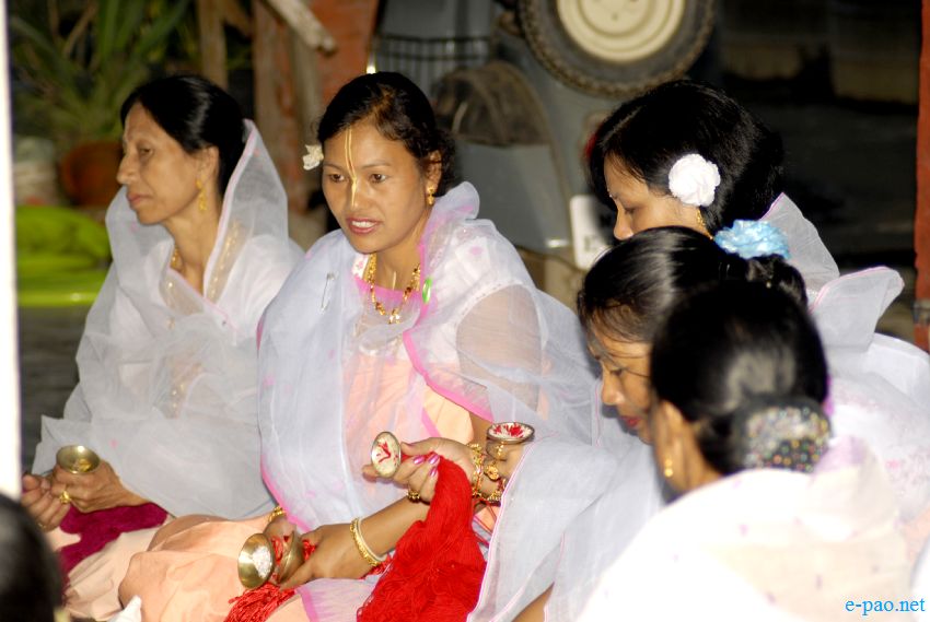 Devotees sing devotional songs on Jhulon Festival at Nityainanda temple, Nityainanda  , Imphal ::  August 2013