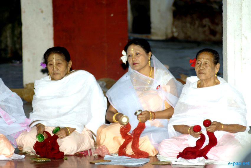 Devotees sing devotional songs on Jhulon Festival at Nityainanda temple, Nityainanda  , Imphal ::  August 2013