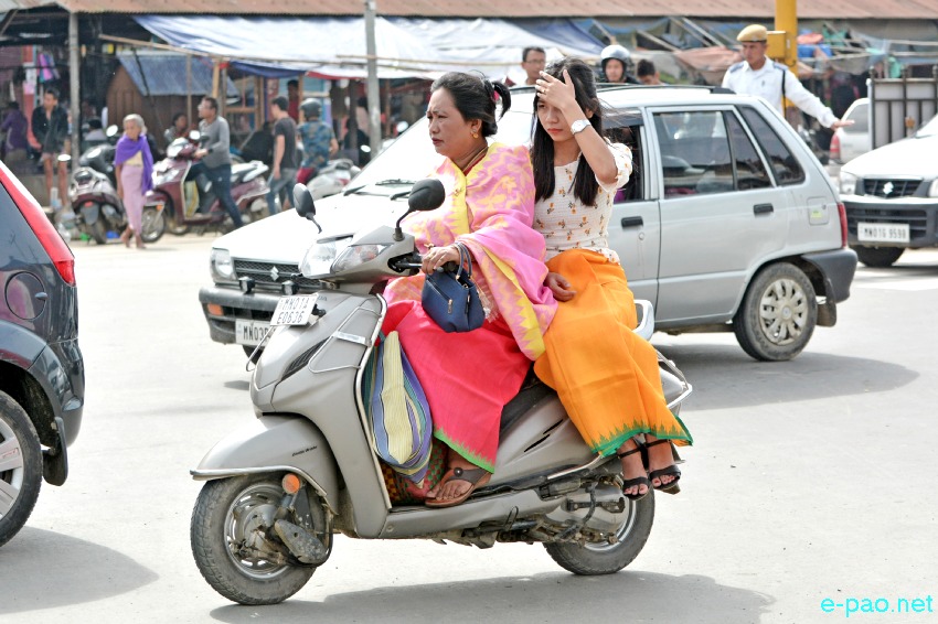 Ningols on the way to her mapam lamdam on the occassion of Ningol Chakkouba at Imphal :: 30 October 2019