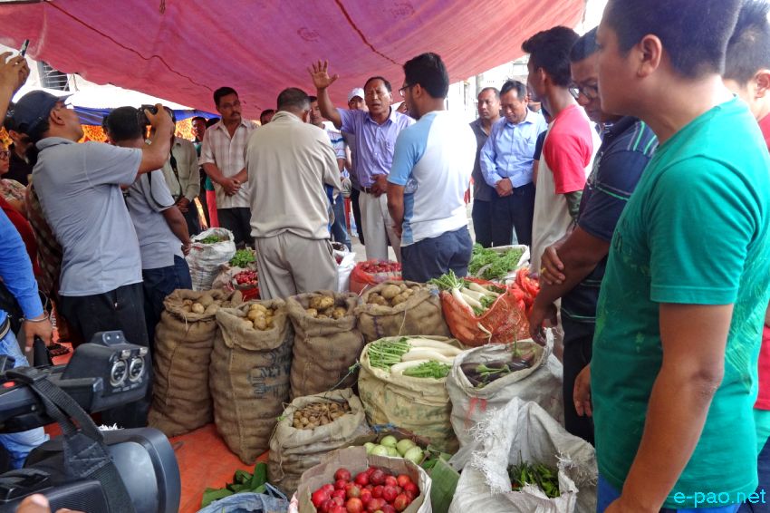 Grocers from Mao in Senapati district selling their locally produced items at Nagamapal  :: July 4 2015