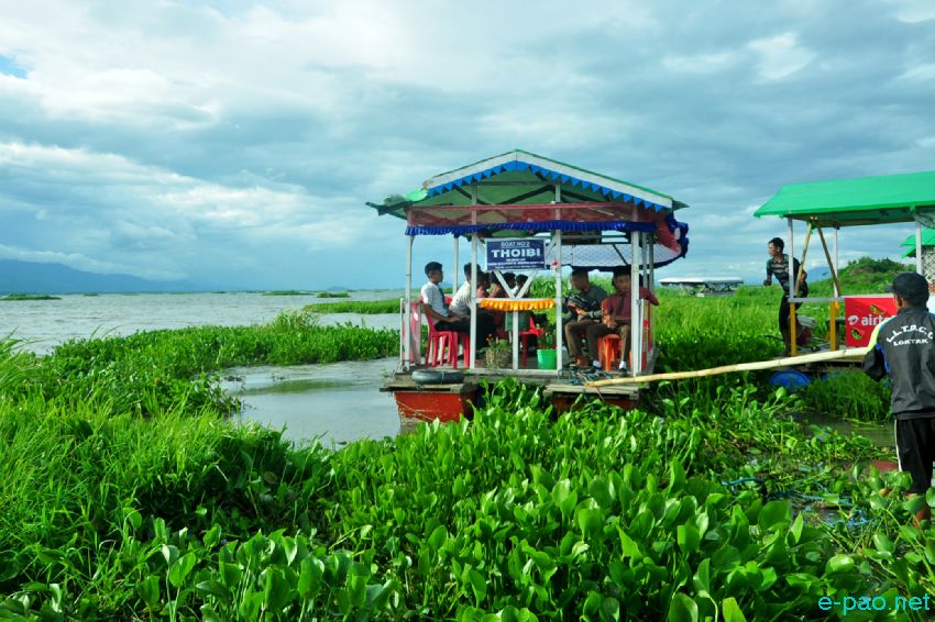 Tourist experiencing Loktak Lake on Boat from Boating Centre at Sendra Chingkhong :: June 22 2016