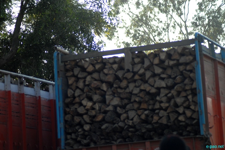 30 fully loaded firewood truck at the northern side of Khuman Lampak Sports Complex, Imphal  :: Januray 16 2013