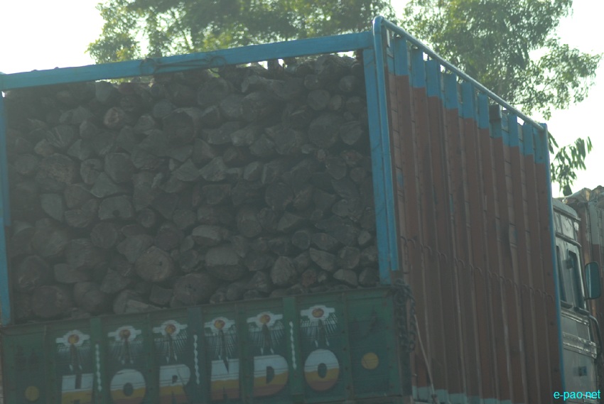 30 fully loaded firewood truck at the northern side of Khuman Lampak Sports Complex, Imphal  :: Januray 16 2013