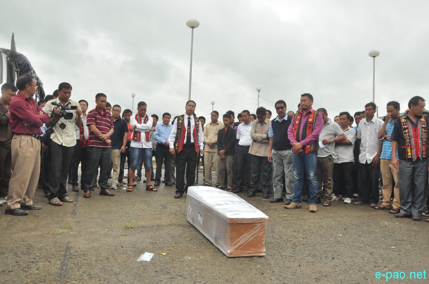 Mortal remains of Akha Shaloni arriving at Imphal Airport :: 23 July 2014
