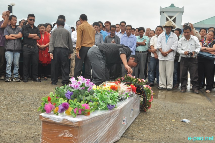 Mortal remains of Akha Shaloni arriving at Imphal Airport :: 23 July 2014