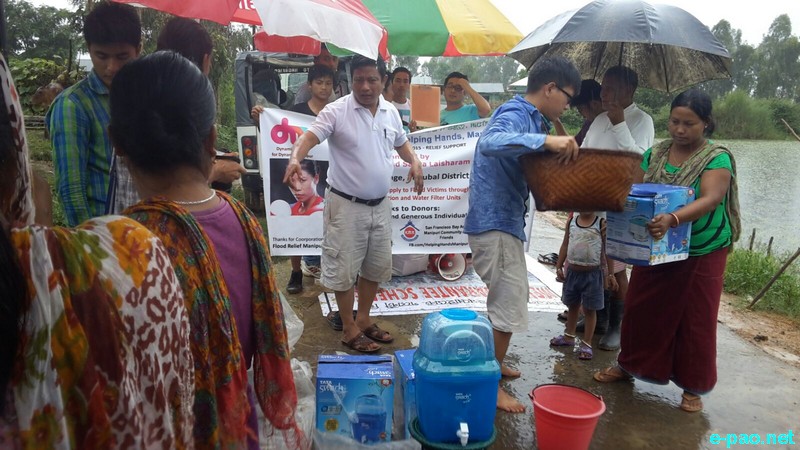 Flood relief materials to the flood affected families of Komnao village :: 03 September 2015
