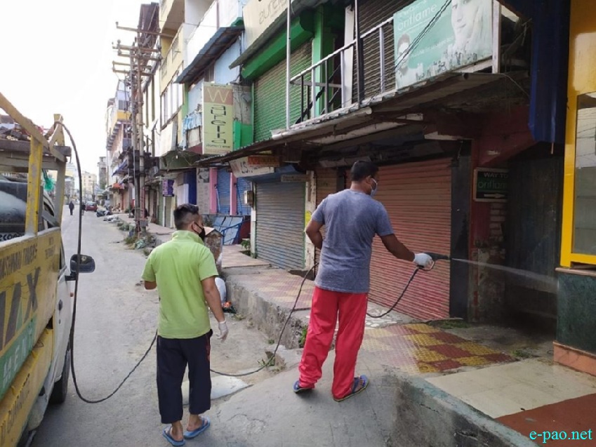 COVID-19 :: Distribution of Essential Items and disinfecting the road at Nagamapal, Imphal :: April 08 2020