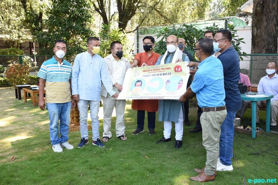 Poster Distribution Programme on COVID-19  by CM N Biren Singh at CM Bungalow, Imphal :: October 30 2020