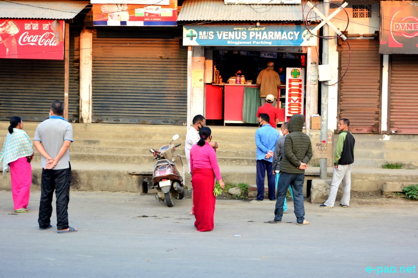 COVID-19 :: Social Distancing observed while buying medicines at Heirangoithong, Singjamei Parking, Chingamathak :: March 25 2020