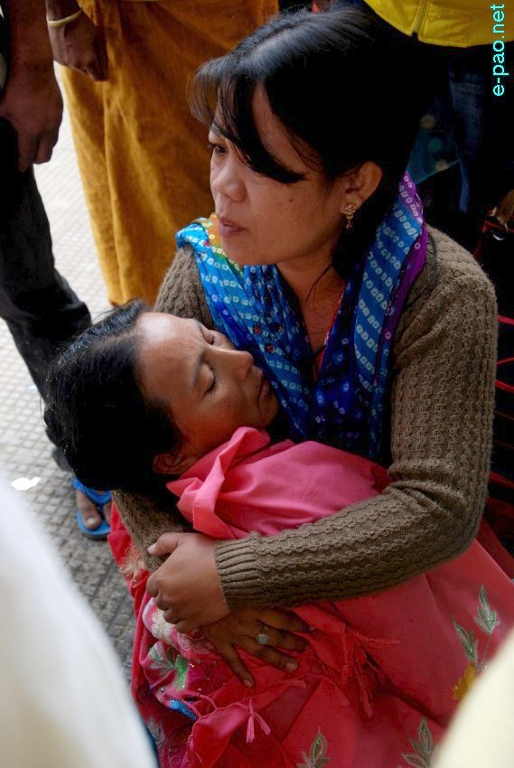 A woman consoling the victim's family after bomb blast at Moirangkhom, Imphal at around 6:20 am on Oct 30 2013 