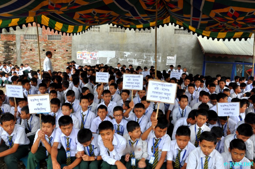 Sit-in-protest by Students and staffs of Standard Robert English School against the abduction of two students :: July 12, 2013