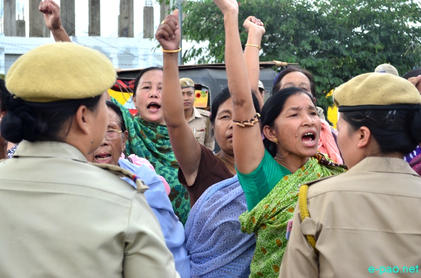Khwairamband Keithel Phambee Ima and Women Civil Society Organisations protesting for implementation of ILPS ( Inner Line Permit System) in Manipur marched towards Raj Bhavan , Governor's residence and BJP Party Office on 21 August 2014 