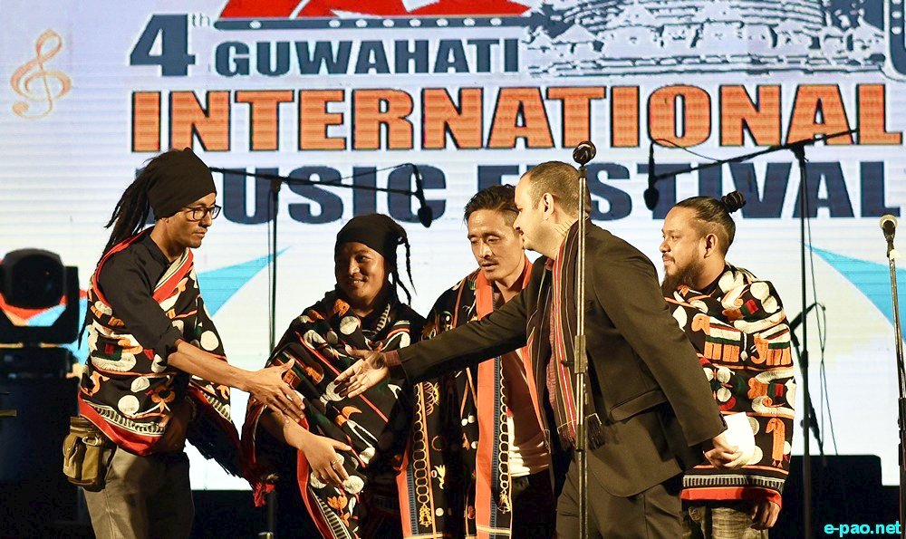 Aiyushman Dutta founder of GIMF presenting the cheque to Salt and Light Travelling Band of Ukhrul Manipur  