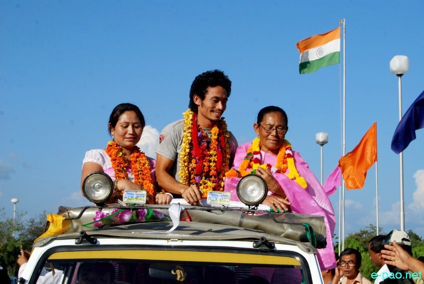 Kh Kothajit and K Chinglensana (Gold Medallist at Asian Games 2014), at Imphal Airport :: October 6 2014