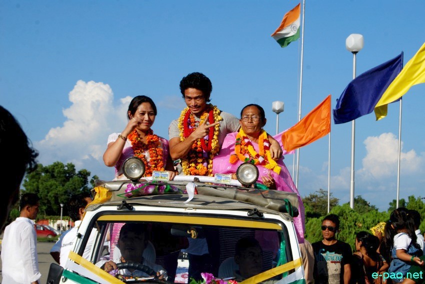 Kh Kothajit and K Chinglensana (Gold Medallist at Asian Games 2014), at Imphal Airport :: October 6 2014