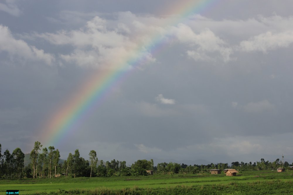 A rainbow as seen in a paddy field in Imphal, Manipur in December 2015