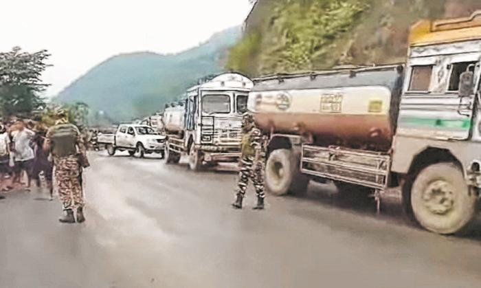 20 Kuki women backed by militants block entire convoy of trucks